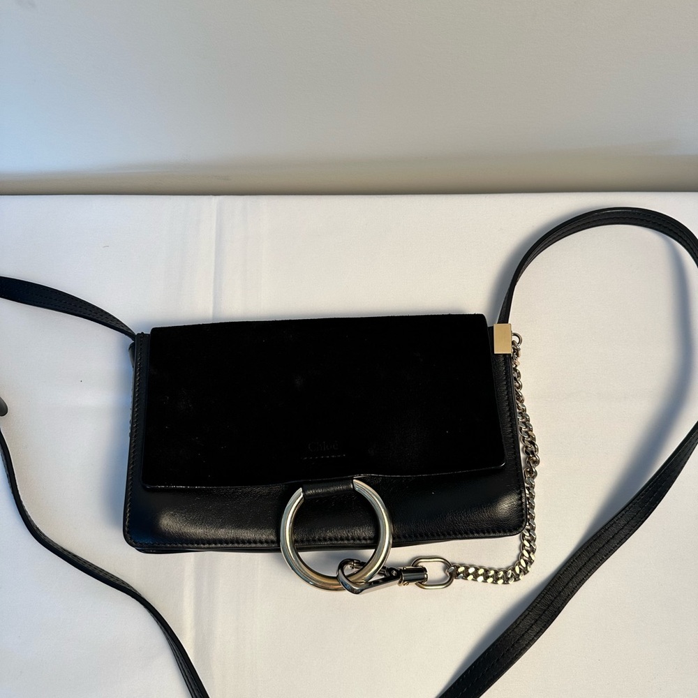 Small black Chloe Faye bag with champagne hardware